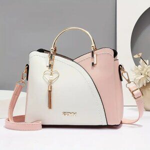 Colorblock tassel accented handbag